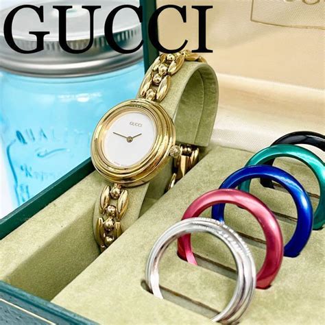 gucci change bezel watch.